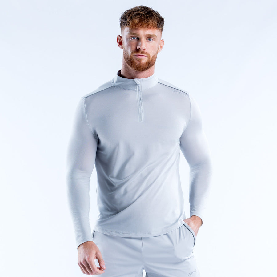 Haut quart de zip Charge Platine